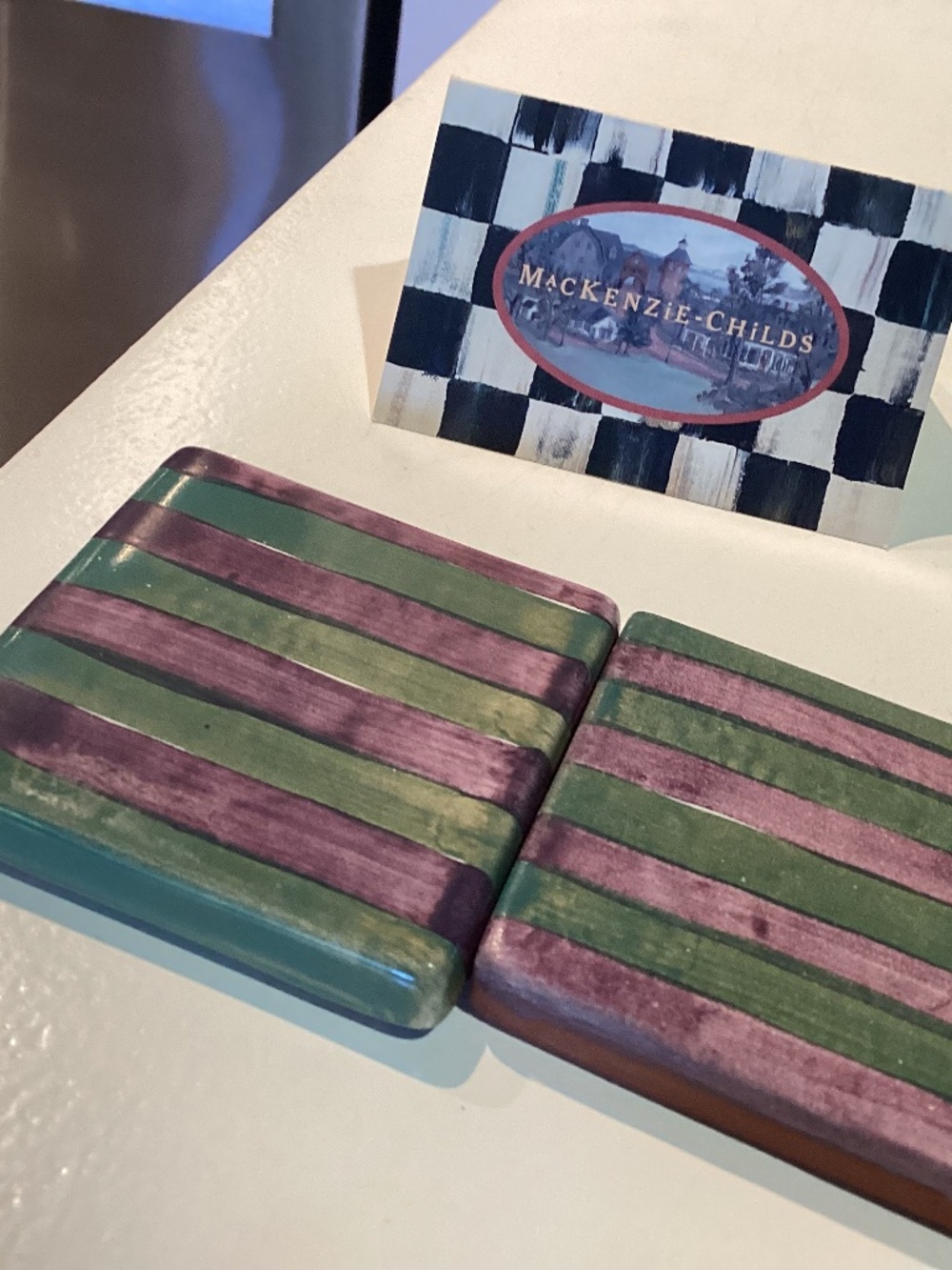 McKenzie child handpainted, bathing suit, striped tiles, purple, and green